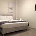 Tins Boutique Suites Hotel